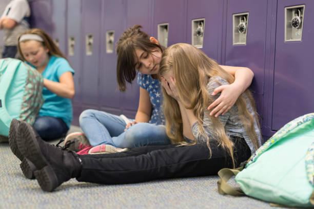 istock A friend consoling her friend at an elementary school 1153541389