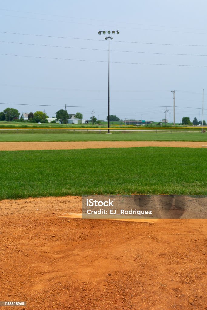 Pitching mound Youth baseball pitching mound on a beautiful Spring day.  LaSalle, Illinois, USA Baseball - Sport Stock Photo