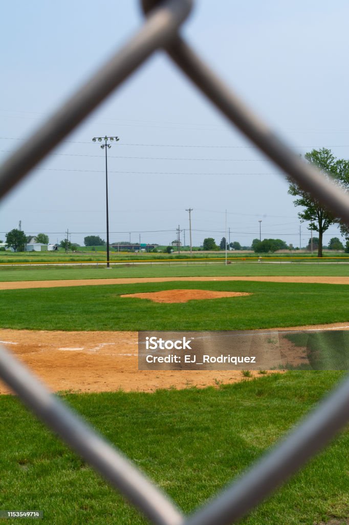 Baseball infield Youth baseball infield on a beautiful Spring day.  LaSalle, Illinois, USA Baseball - Sport Stock Photo