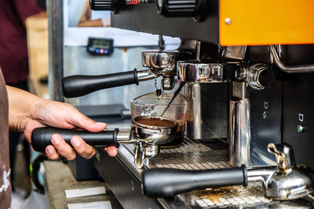 istock Coffee pouring machine close up in modern cafe 1153551822