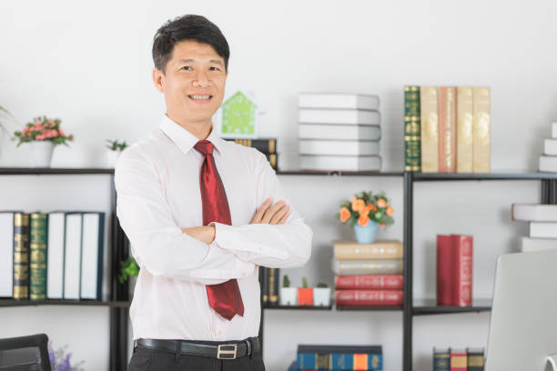 istock Asian business man at office 1153556246