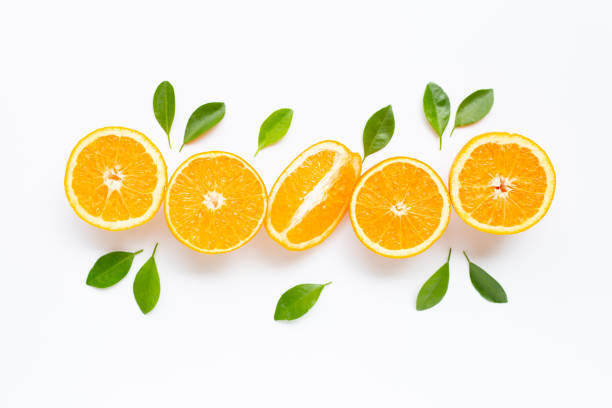 istock High vitamin C. Fresh orange citrus fruit with leaves isolated on white background. 1153565306