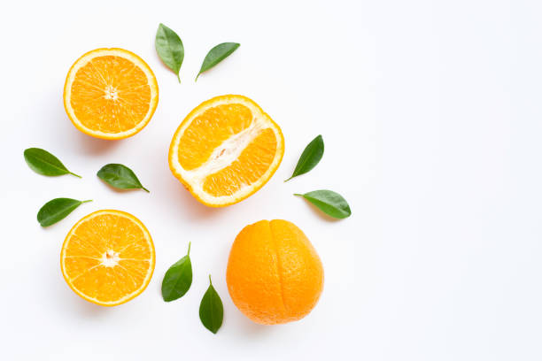 istock High vitamin C. Fresh orange citrus fruit with leaves isolated on white background. 1153565353