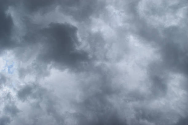 istock Cumulonimbus cloud formations on tropical blue sky 1153566106