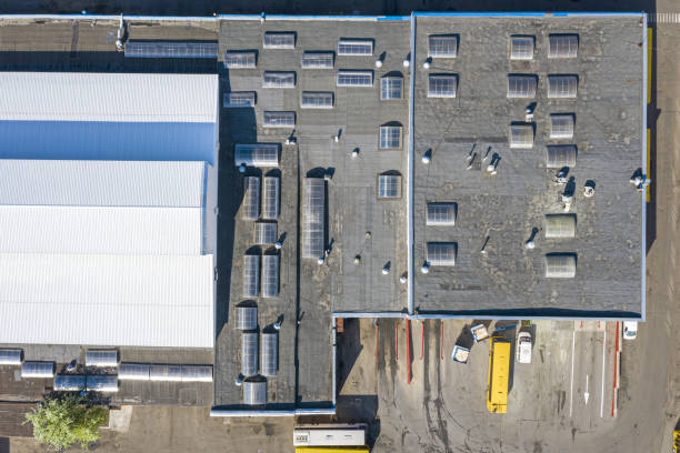 istock bus station garage building with grey flat roofing. aerial view 1153566359