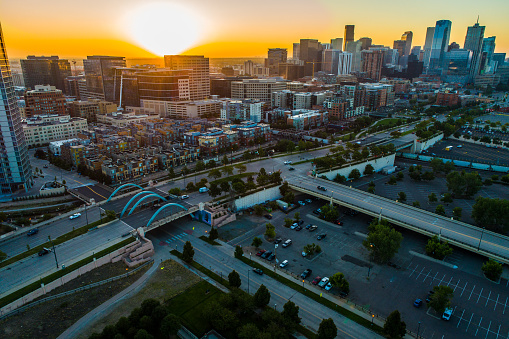 AERIAL: Golden Sunrise over Denver , Colorado , USA Urban Cityscape Drone view