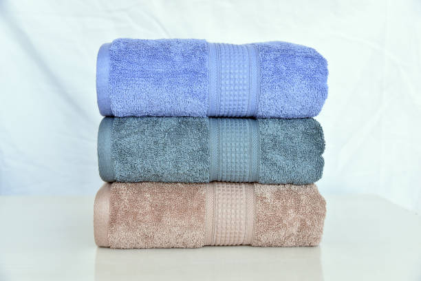 istock STACKED SOFT COTTON BATH TOWEL 1153575386