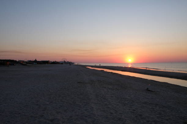 istock dawn on the sea in summer 1153576745