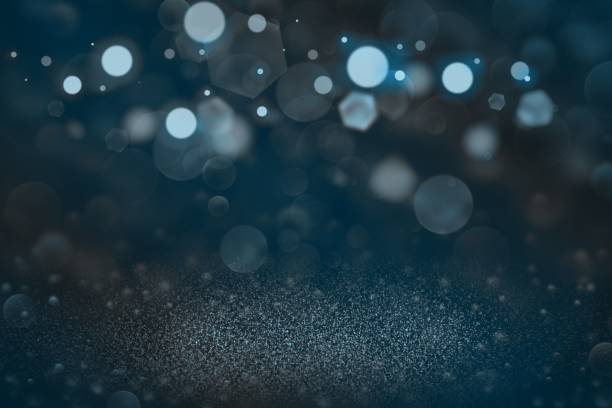 istock light blue wonderful brilliant glitter lights defocused bokeh abstract background, festive mockup texture with blank space for your content 1153578163