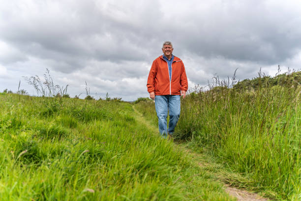 istock Active senior man in countryside 1153578381
