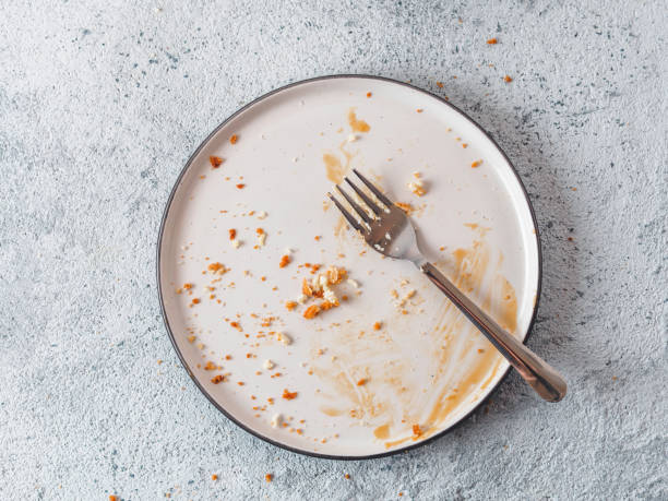 empty dirty plate, top view - dirt food plate fork imagens e fotografias de stock