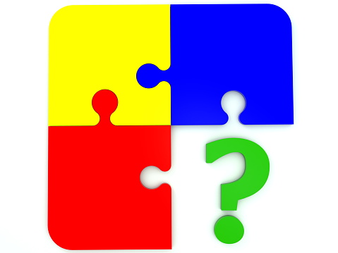 Colorful puzzle with green question mark on white