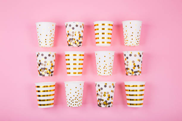 istock Paper cups on pink background. 1153591875