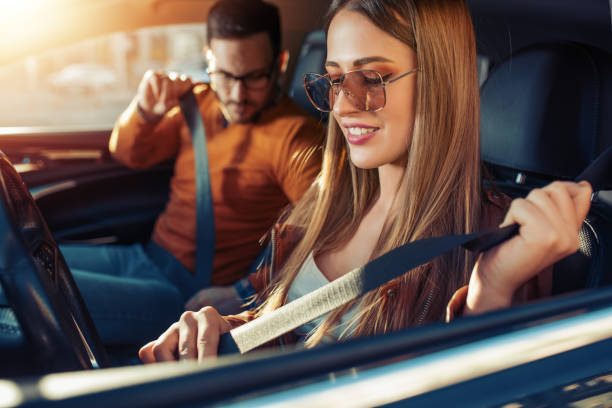 istock Happy young couple in the car 1153593255