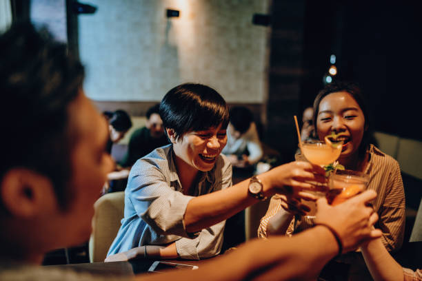 istock Chinese millennial generation drinking cocktails. 1153593758