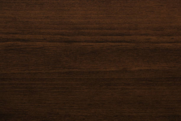 istock dark brown wood plank abstract or vintage board texture background 1153595656