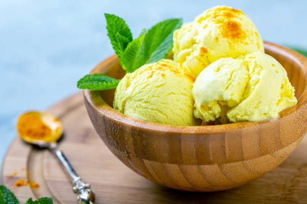istock Artisanal ice cream with turmeric (Golden ice cream). 1153598925