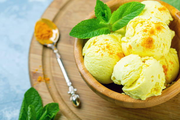 istock Golden ice cream with turmeric closeup. 1153599065