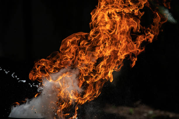 istock Closeup Fire flames from gas explosion on black background. 1153599113