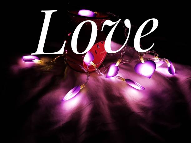 istock Love texture with a beautiful color light led background. 1153599278