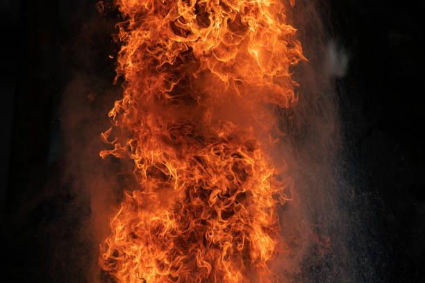 istock Closeup Fire flames from gas explosion on black background. 1153599287