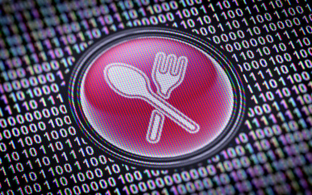 dinner time icon on the screen. - binary code close up computer data imagens e fotografias de stock