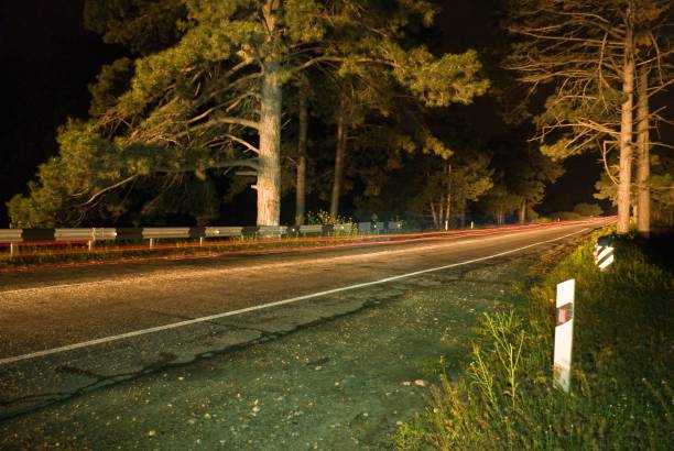 istock asphalt road at the night 1153604008