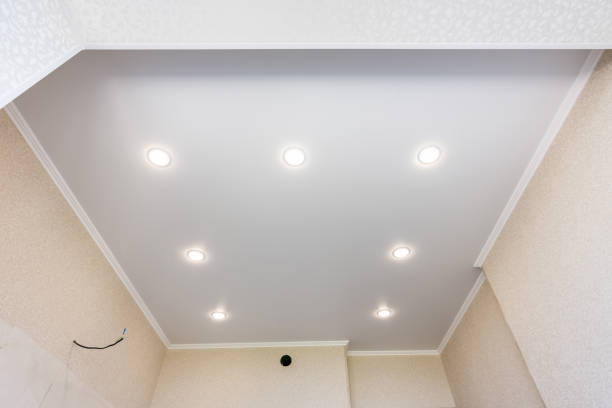 istock Stretch ceiling in the kitchen with installed and included spotlights 1153606514