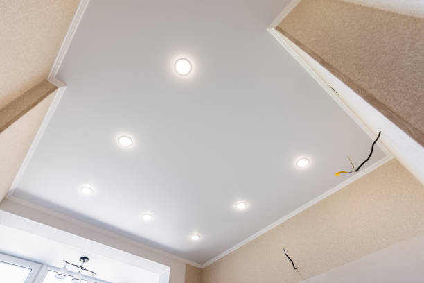 istock Stretch ceiling in the kitchen with installed and included spotlights 1153606520