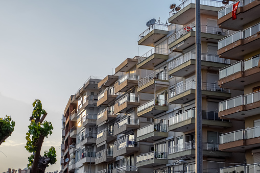 Balconies of a residential high-rise building. Residential buildings in the city.