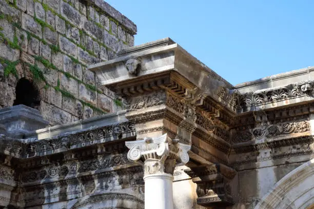 Photo of Hadrian's Gate, Antalya landmark. Ancient construction of the Gate of Hadrian