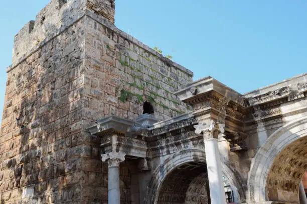 Photo of Hadrian's Gate, Antalya landmark. Ancient construction of the Gate of Hadrian