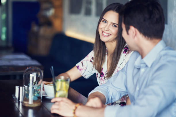 istock Romantic couple dating in restaurant 1153610760