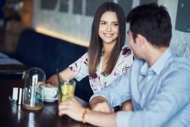 istock Romantic couple dating in restaurant 1153610810