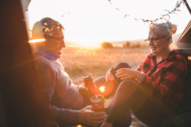 istock Senior couple outdoors with car 1153613991