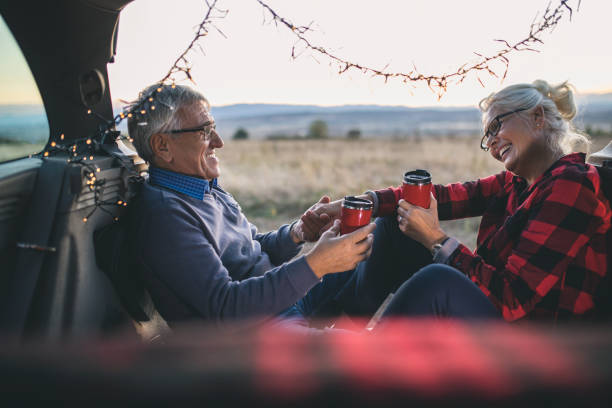 istock Senior couple outdoors with car 1153615209
