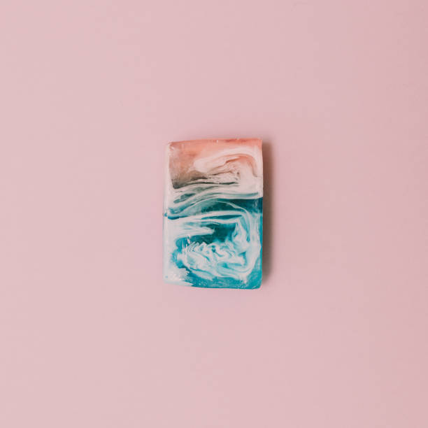 istock Marbleized effect on soap slice. Soft flamingo pink color 1153615834