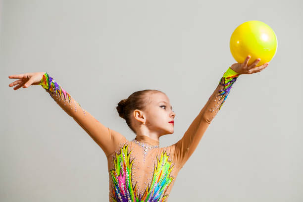 girl athlete rhythmic gymnastics girl athlete rhythmic gymnastics artistic gymnastics stock pictures, royalty-free photos & images