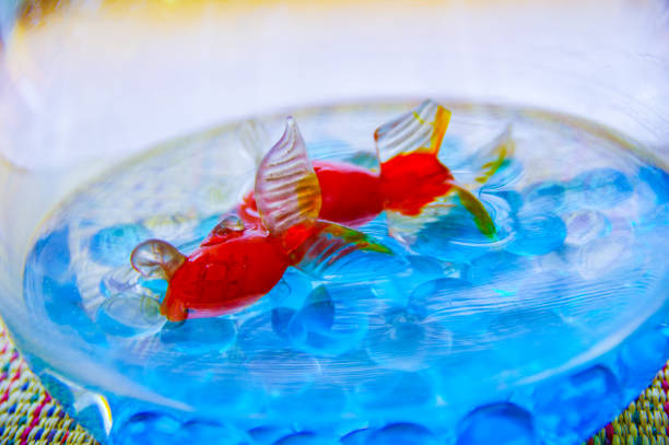istock Water tank decorated with marbles and goldfish figurines 1153617695
