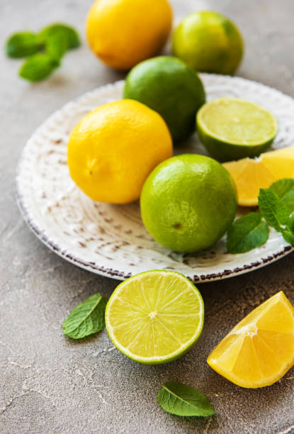 istock Plate with lemons and limes 1153620819