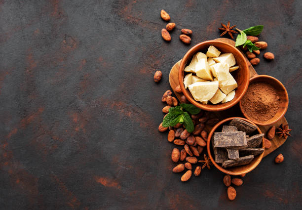 istock Cocoa beans, butter and chocolate 1153620843