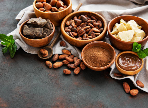 istock Cocoa beans, butter and chocolate 1153620855