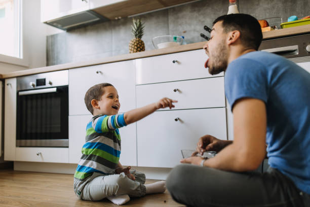 istock Father and son in the kitchen 1153632680