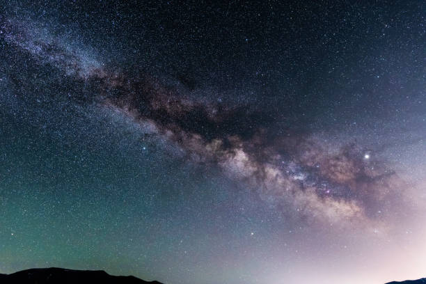 istock Beautiful night landscape, milky way galaxy. Space background. 1153638458