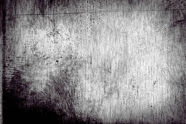 istock Scratched dirty dusty copper plate texture, black and white image. 1153638467
