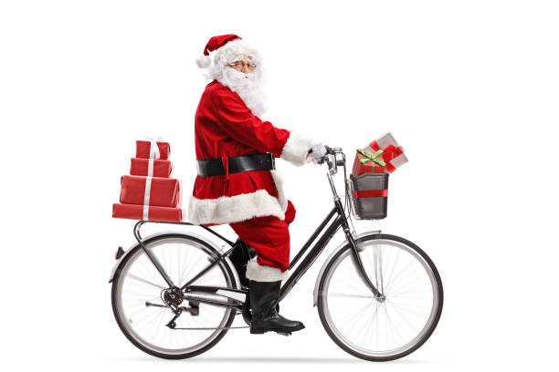 istock Santa Claus riding a bicycle 1153638814