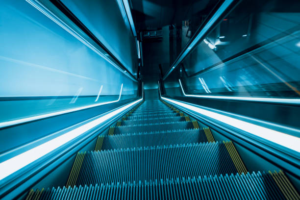 istock View of escalator in modern station 1153640938