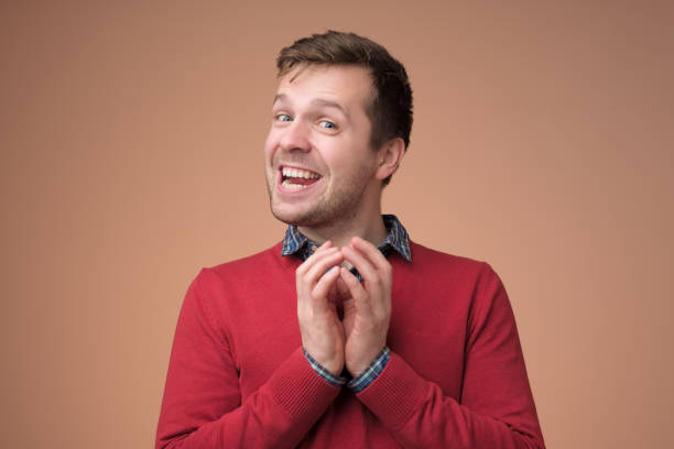 istock Young european man being curious about news. 1153644123