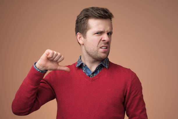 istock Young man pointing finger at himself. Studio shot 1153646520