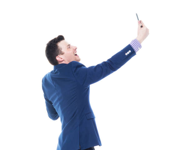 istock Handsome businessman taking a selfie 1153646728